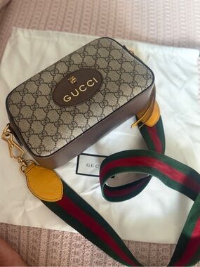 Authentic Gucci supreme neo bag. Used in good condition comes with a dust bag